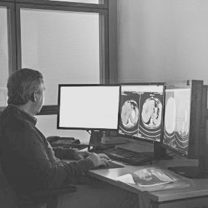 Independent image read — radiologist at workstation